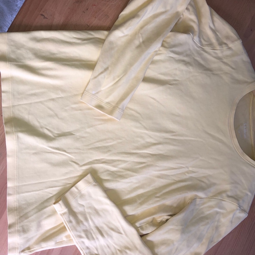 Light yellow L.L.bean shirt.
